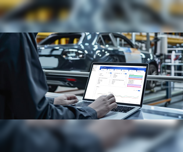 Modern Automotive Digital Dashboard and Cloud Management Alt Text: A high-tech digital interface displaying real-time automotive dealership analytics, including inventory tracking, customer data, and sales performance on a tablet and desktop screen.